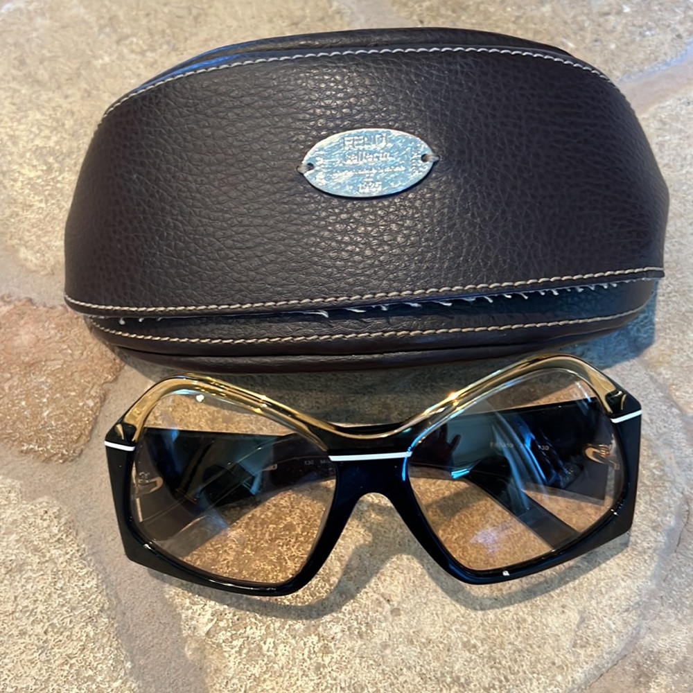 Authentic Fendi sunglasses with brown case